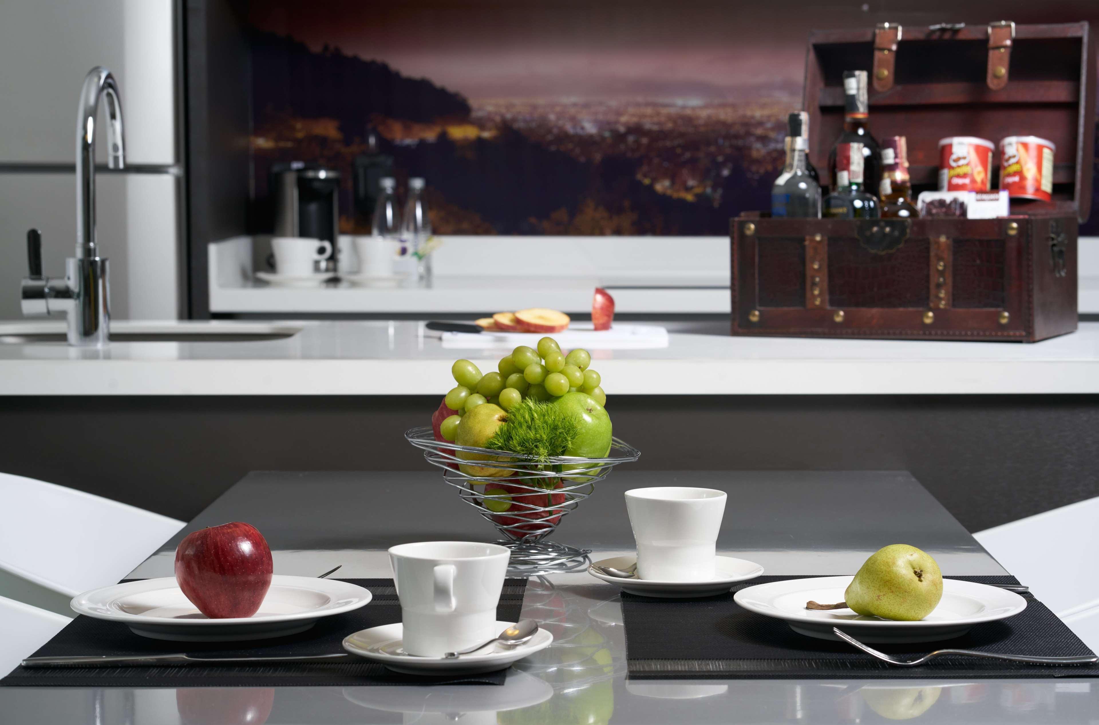 Hotel 100 Luxury Suites By Preferred 波哥大 外观 照片 A kitchen with a built-in coffee machine